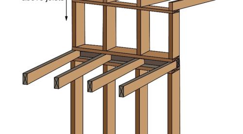 This interior wall is intersected by two ceilings of different heights; it is built as two walls stacked on one another, each having a bottom and top plate which act as barriers to airflow between levels.