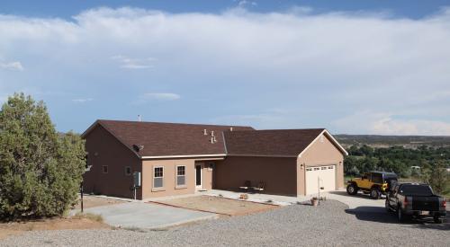 Palo Duro Homes built this production home in the mixed-dry climate in Albuquerque, NM, and certified it to DOE Zero Energy Ready Homes specifications in 2013. 