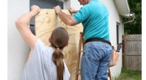 Right - Panels of 7/16-inch treated plywood are inexpensive but take time to install and are difficult to install on higher windows.
