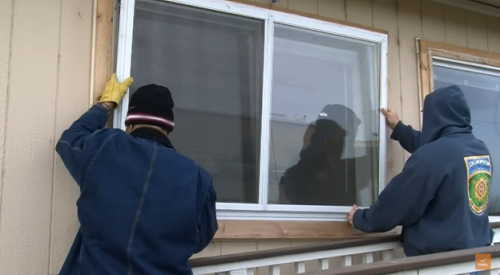 Position the storm window into opening, to ensure proper fit.