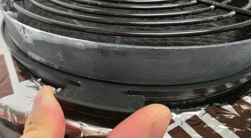 Re-install the air filters in your heat pump water heater by sliding it back into place in the filter slot
