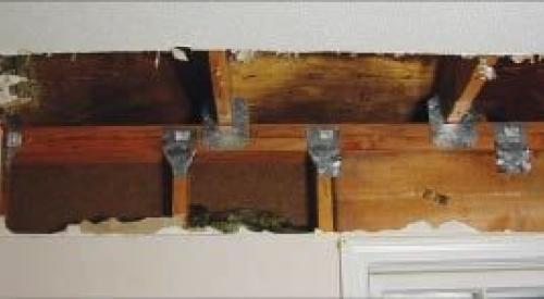 Add metal connectors to strengthen framing connections in an existing wall from inside the home by removing drywall. 