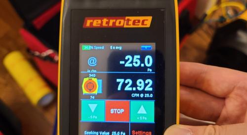 This digital manometer contains a pressure transducer used to determine pressure differences or flow rate for measuring air leakage in ducts; it is showing 72.92 cfm of leakage at 25 Pascals of depressurization of the ducts. 