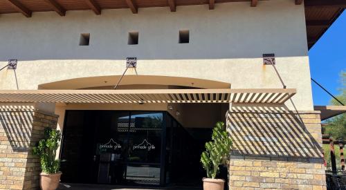Right – deeply inset entryways and overhangs provide shade to reduce solar heat entry to this building.
