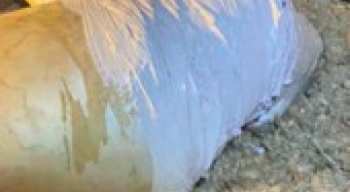 This rigid duct connection was repaired using self-piercing/self-drilling sheet metal screws to mechanically secure the connection; then it was air sealed using UL-181 fiber-reinforced duct sealant mastic paste 