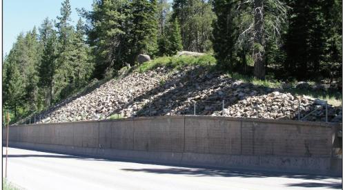 Riprap erosion protection placed on the cut slope above the retaining wall