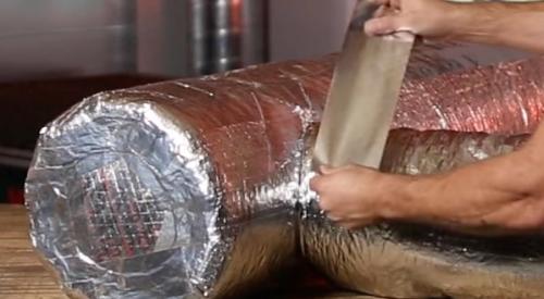 Tape over the seam connecting the flex duct to the trunk duct; in this case two 3-inch-wide pieces of tape were put together then laid over the seam.