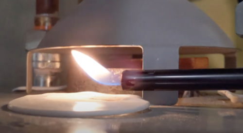 Use a long stick lighter or incense stick to see if an ambient draft gas water heater is backdrafting