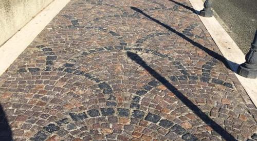 Pavers, gravel, stone, and other permeable surfaces allow rainwater some opportunity to drain minimizing storm water runoff.