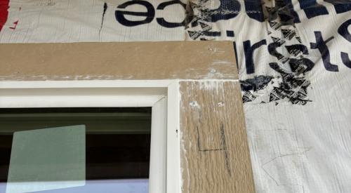 Right - Joints, seams, and nails in window trim have been caulked and seams in house wrap have been taped.