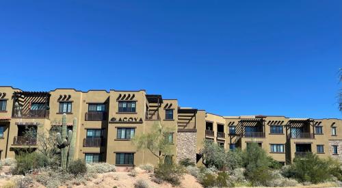Wrong - this building provides no overhangs, minimal window shading, and clear window glass resulting in high solar heat gain.