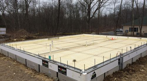 ICF foundation walls wrap the floor slab in R-22 of insulation while the entire space under the slab is covered with 4.3 inches of closed-cell spray foam.