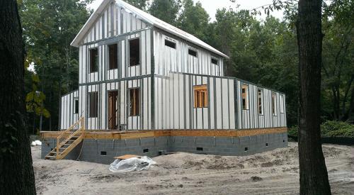 The walls of this mixed-humid location home are constructed with moisture-resistant steel-framed expanded polystyrene R-34 wall panels that are designed to withstand winds up to 200 mph and level D seismic forces.