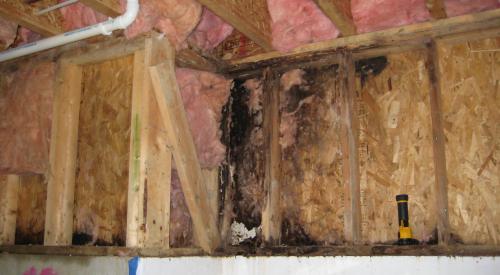 Wall damage caused by leak due to improper flashing