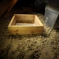 Right - A wood dam was constructed to hold back the attic floor insulation