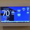 Right - The advanced controls in a programmable thermostat can be used to improve the efficiency of the home’s HVAC system.