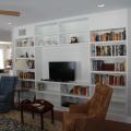 A ducted minisplit heat pump is hidden in the ceiling of this centrally located room with short duct runs to the registers located on each wall of the room.