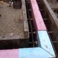 This 4-inch layer of rigid foam insulation (R-20) will be sandwiched between two layers of concrete poured on site for a highly insulated foundation wall.