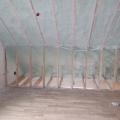 ICF walls and an attic sealed and insulated to R-63 on the underside of the roof deck with 10 inches of open‐cell spray foam plus 2.7 inches of closed‐cell spray foam provide a complete thermal break around this home. 
