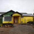 Over the coated sheathing air barrier, the builder installed a continuous layer of 2-inch rigid foam and then covered this with a yellow mesh rain screen layer. 
