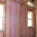 Rigid foam insulation was installed at the perimeter of the one-level apartments before installing ceiling drywall to ensure a minimum R-21 attic perimeter insulation.