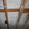 The builders sprayed the underside of the roof assembly with 6 inches of open-cell spray foam to create an unvented, R-48 insulated attic.