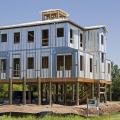 This coastal home was built on a flood-resistant pier foundation using hurricane- and moisture-resistant expanded polystyrene and steel wall panels and hurricane strapping. 