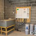 Lithium-ion batteries charged by the solar photovoltaic panels provide 200 amperes of standby electricity to critical circuits in case of power failure due to severe weather conditions.