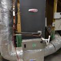 The high-efficiency air-to-air heat pump is set in an overflow pan with an emergency shut off sensor in case the condensate tube were to clog and cause condensate to fill up the pan.