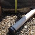 Wrong – The footing drain pipe should end at least 10 feet from the foundation if above ground or should drain into a drywell or storm sewer. 
