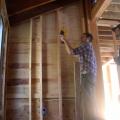 Builders use an infrared camera to “see” heat flow and air leakage around a window during construction. 