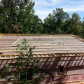 On top of the ice-and-water shield, the builder installed horizontal beams that were raised 6 inches off the deck to allow room for spray foam insulation. 