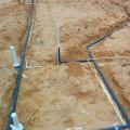 Hot water recirculation loop runs through an insulated pipe under the home’s concrete slab. 