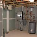 The wall hung boiler provides heat for the central air handler as hot water.