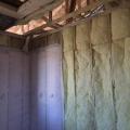 Unfaced batt and blown fiberglass wall insulation are installed to RESENET Grade 1 standards with no gaps or voids.