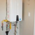 A natural gas 94% efficiency tankless hot water heater provides endless hot water.