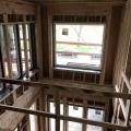 The highly efficient double wall system consists of two sets of stud walls set side by side to create a 12-inch-thick double-stud wall cavity that is filled with a continuous blanket of R-44 dense-packed cellulose insulation. 
