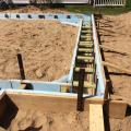 The Habitat affiliate makes its own “ICF” foundation walls with rigid foam held in place with wood spacers. 