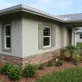 ENERGY STAR reflective roof shingles and low-SHGC windows with low-emissivity coatings help to minimize solar heat gain.
