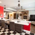 The kitchen features a roll-under sink and counter top design for wheelchair accessibility.