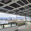 PV panels provide shade while producing power over this 5-story multifamily project in San Francisco.