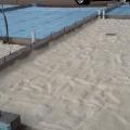 Spray foam and rigid foam were used under the slab while rigid foam wraps the exterior of the foundation walls.