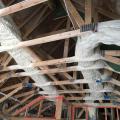 HVAC ducts can be encapsulated in 3 inches of closed-cell spray foam, then buried in R-49 of blown fiberglass insulation after the ceiling drywall is installed in the vented attic. 