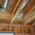 Right - The HVAC ducts are located between floors in conditioned space.