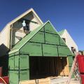 Right – The seams are taped on the coated OSB sheathing of this home to provide a complete air barrier.