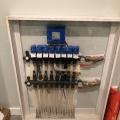 Right – An air-to-water heat pump efficiently provides hot water for radiant floor heating.