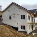 Right – A paint-on flashing was applied to the window frames of this ICF house before installing the windows.