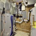 Right – A utility room provides adequate space for the home’s mechanical systems and electronic smart home monitoring equipment.
