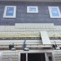 Right – A rigid rain screen product completely covers the wall behind the cladding and window framing.