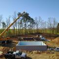 Right – Precast concrete basement walls come to the site with integrated insulation and steel-faced concrete studs.